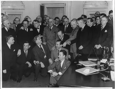 [Harry S. Truman, half length, standing facing left; with Democratic Senators at the White House]