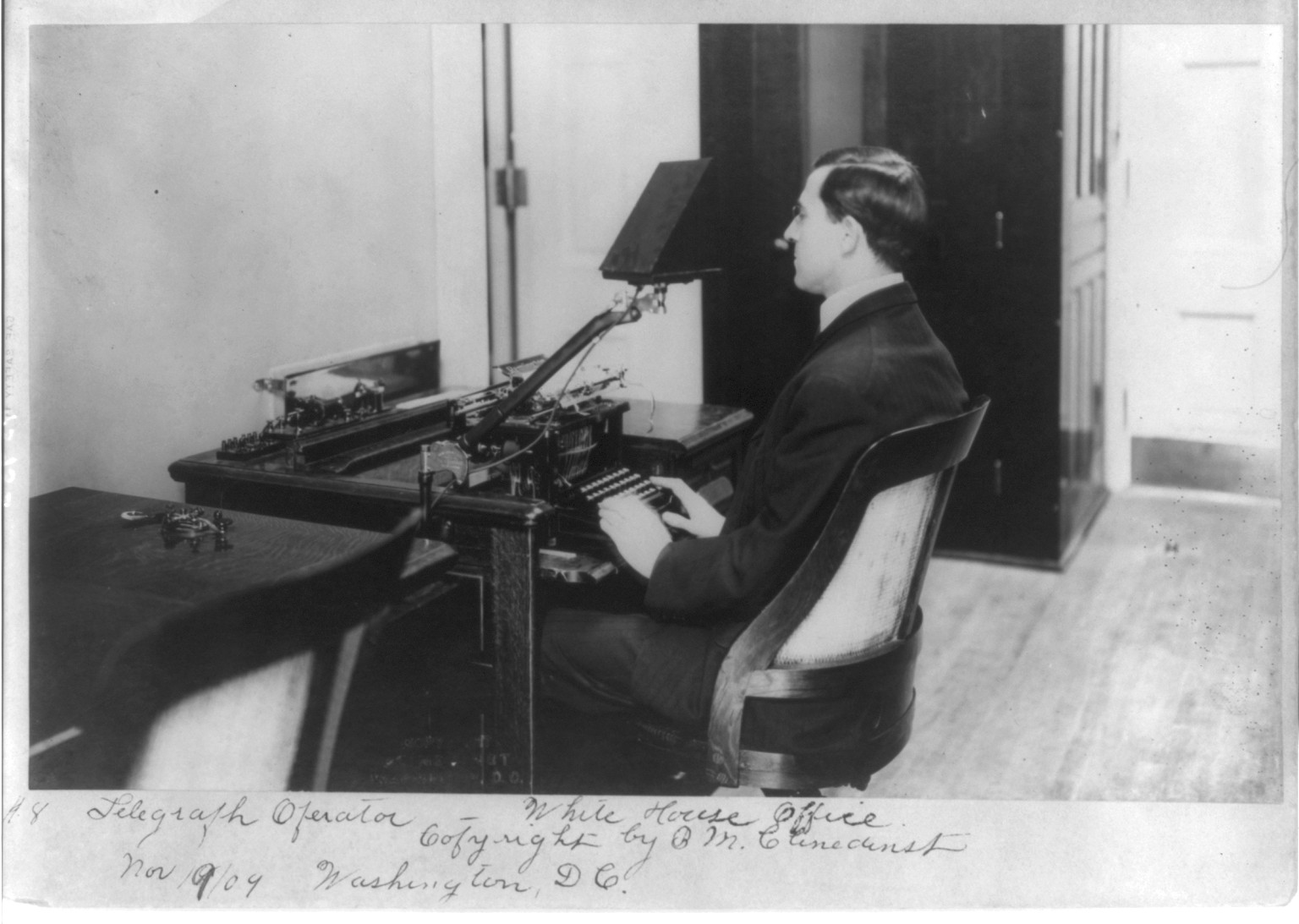 [D.C. Wash. - White House Offices: Telegraph operator at work], c1909. — historic photograph