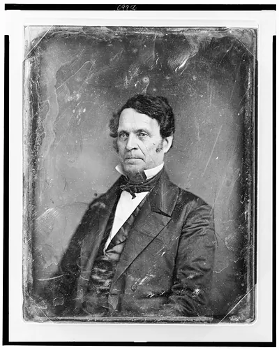 Daguerreotype portrait of a man in dark suit and cravat