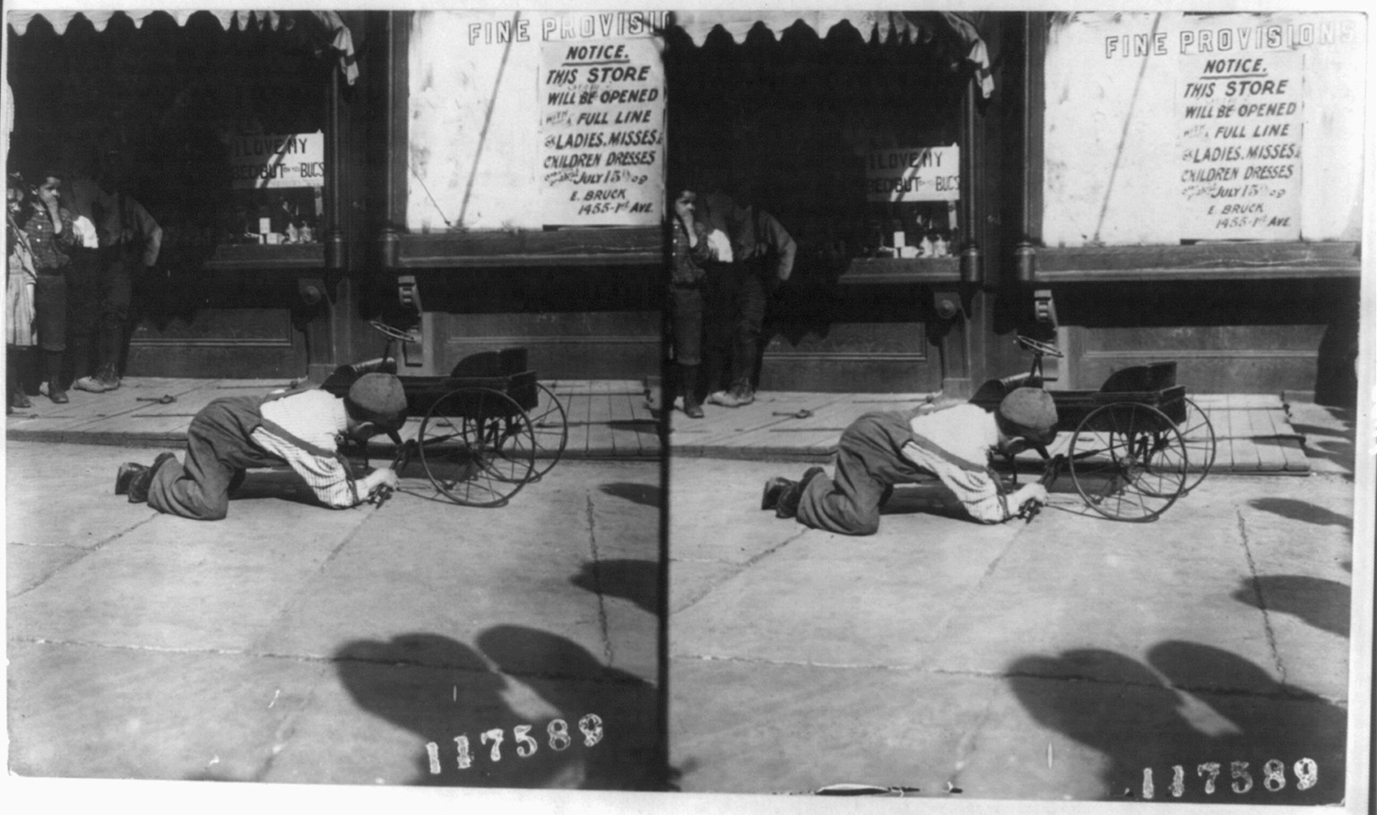 A young mechanic fixing his auto, c1911 June 19. — historic photograph
