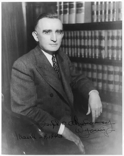 [Joseph Mahoney, half-length portrait, seated, facing left]
