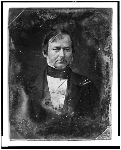 Daguerreotype portrait of a bearded man in a dark coat