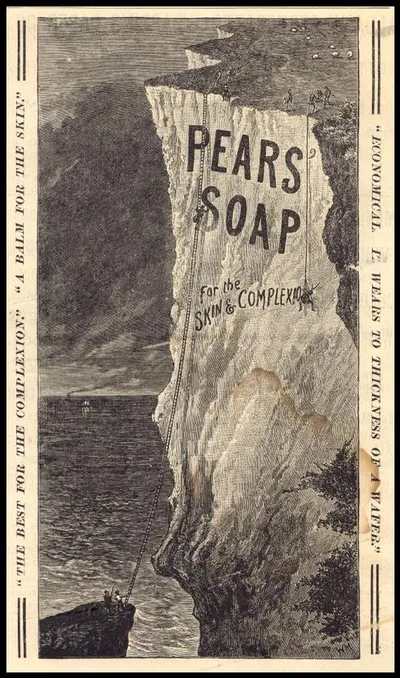 Pears Soap advertisement showing white cliff with climbers