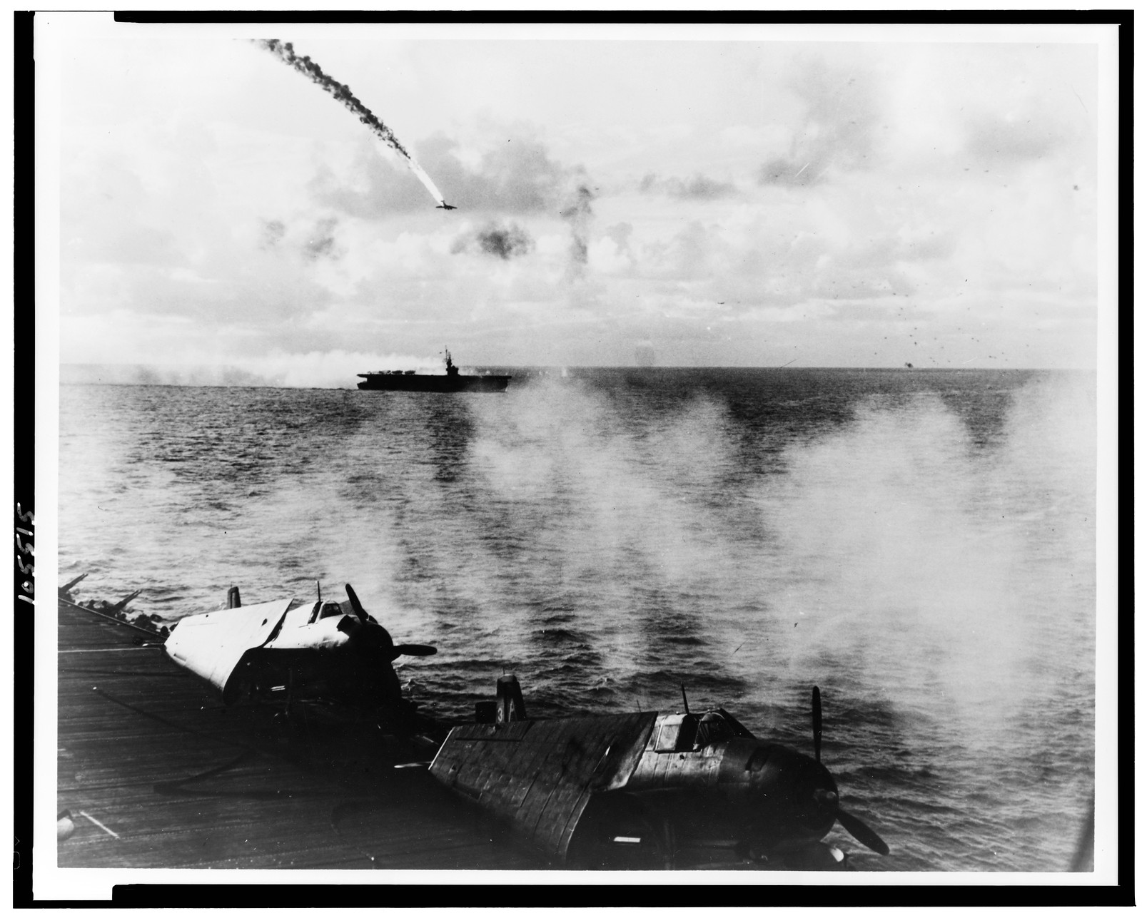 Japanese plane shot down as it attempted attack, USS Kitkun Bay, 1944 June 18. — historic photograph