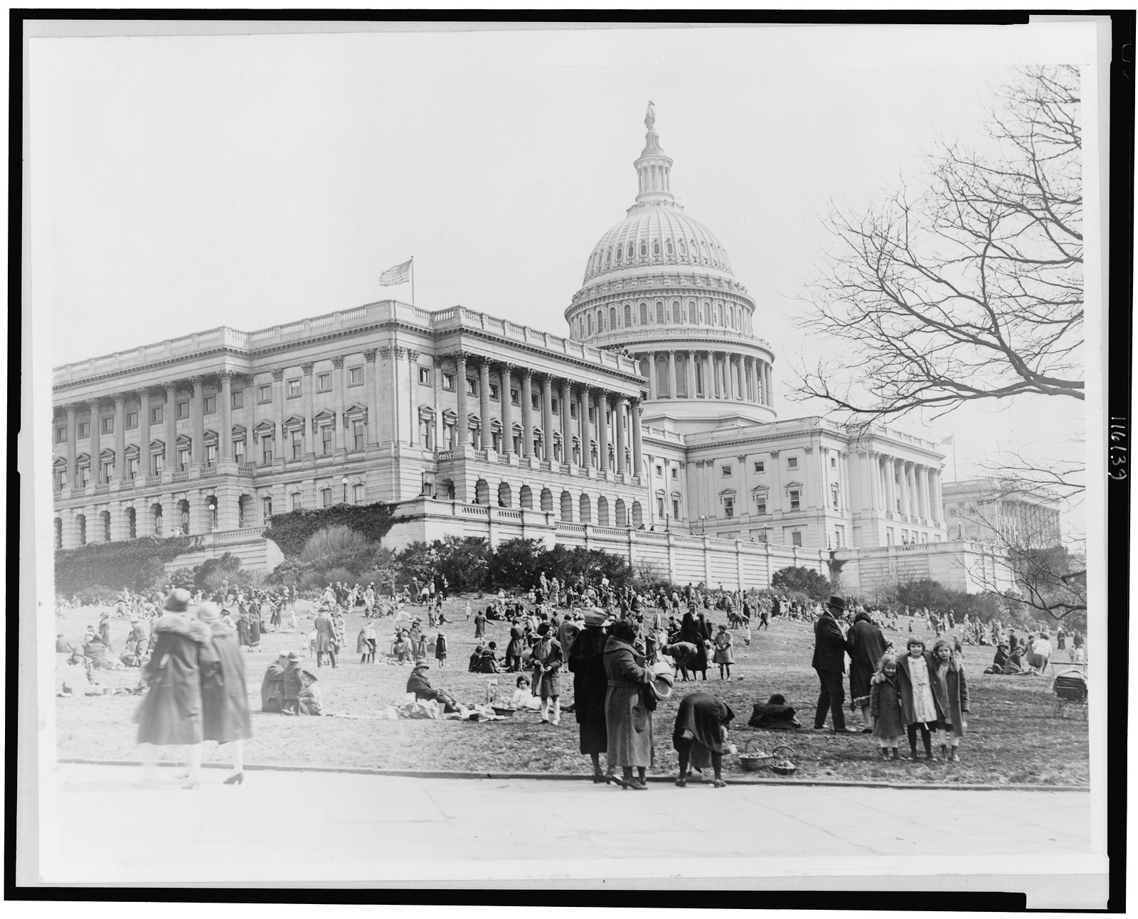 The Capitol--Egg rolling on the grounds at Easter, [between 1920 and 1932] — historic photograph
