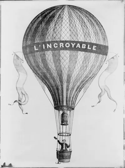 [Balloon L'Incroyable" aloft with man waving from basket]"