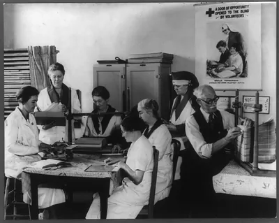 [American Red Cross volunteer group transcribing books into braille]