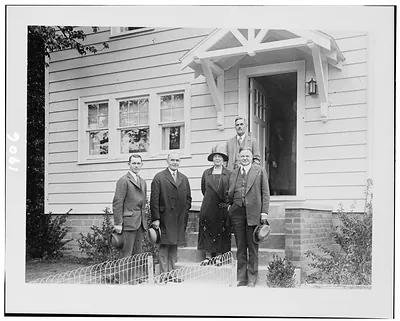 Hoover and Jardine visit model home / Underwood & Underwood, Washington.