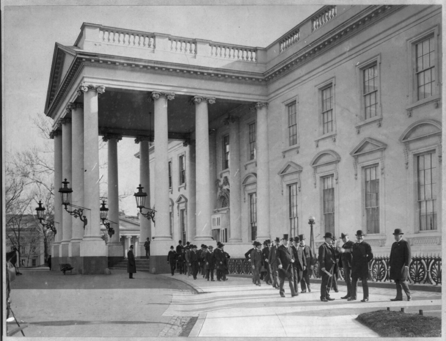 [North portico of the White House, with group of men in front] — historic photograph
