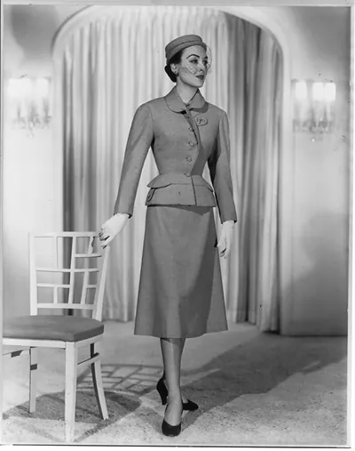 Women modeling fashions 1951-1952: Light Carnegie blue" suit from Hattie Carnegie's fall and winter 1951-52 collection"