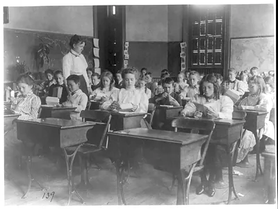 [Washington, D.C. public schools, 1st Div. - class making geometric forms with paper]