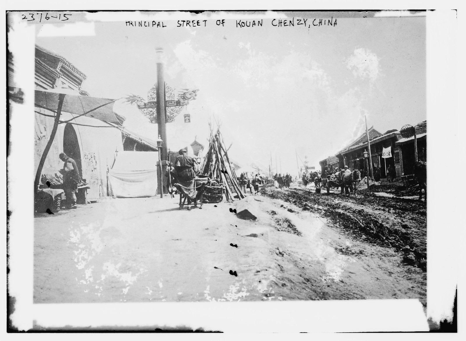 Principal street of Kouan Chenzy, China, n/a — historic photograph