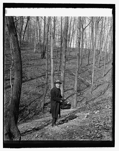 Dr. Walter Hough of Smithsonian in arrowhead quarry (Rock Creek Park), 3/6/26