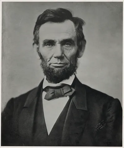 Studio portrait of a bearded man in a bow tie