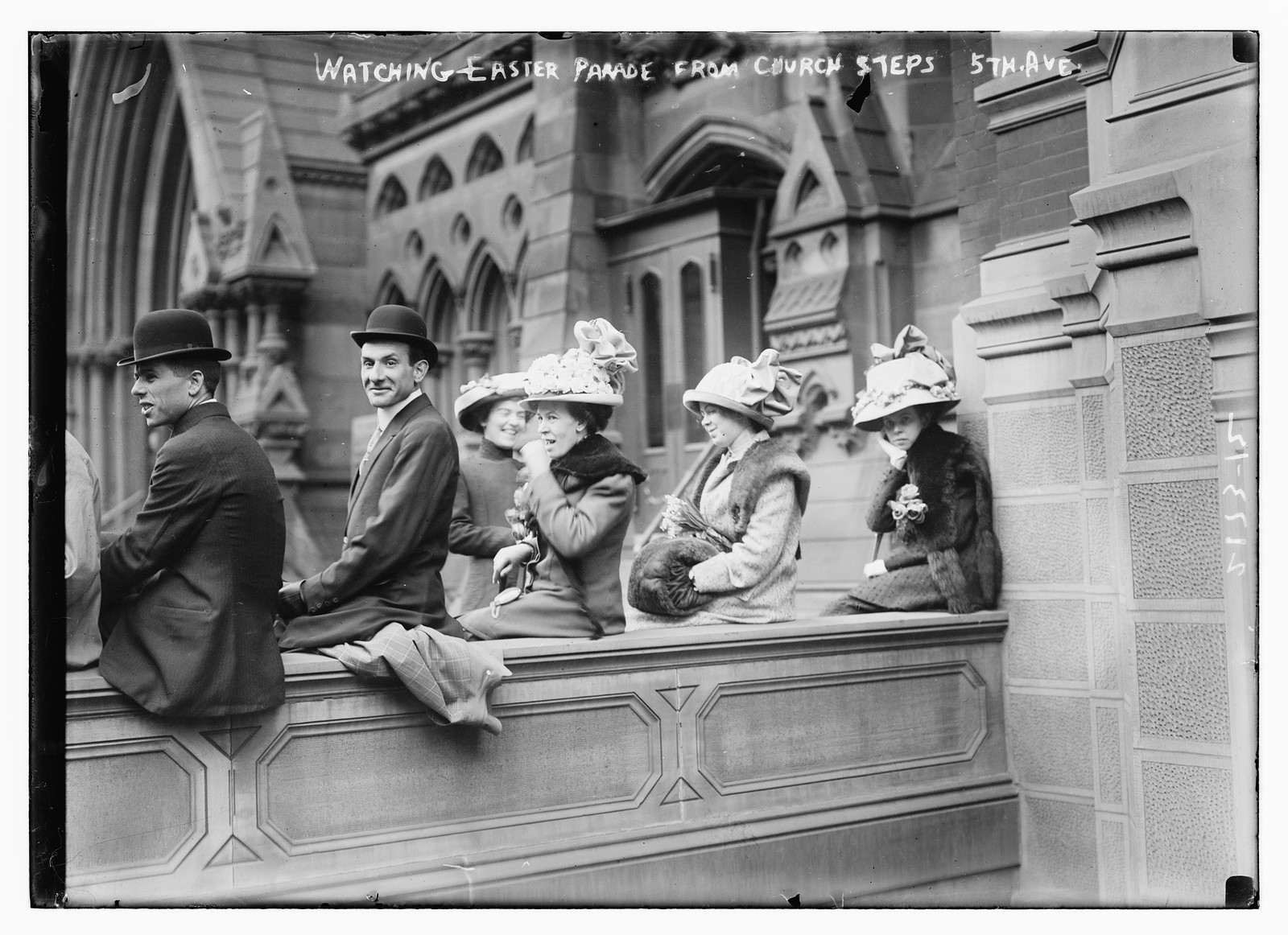 Watching Easter Parade from church steps, 5th Ave., n/a — historic photograph