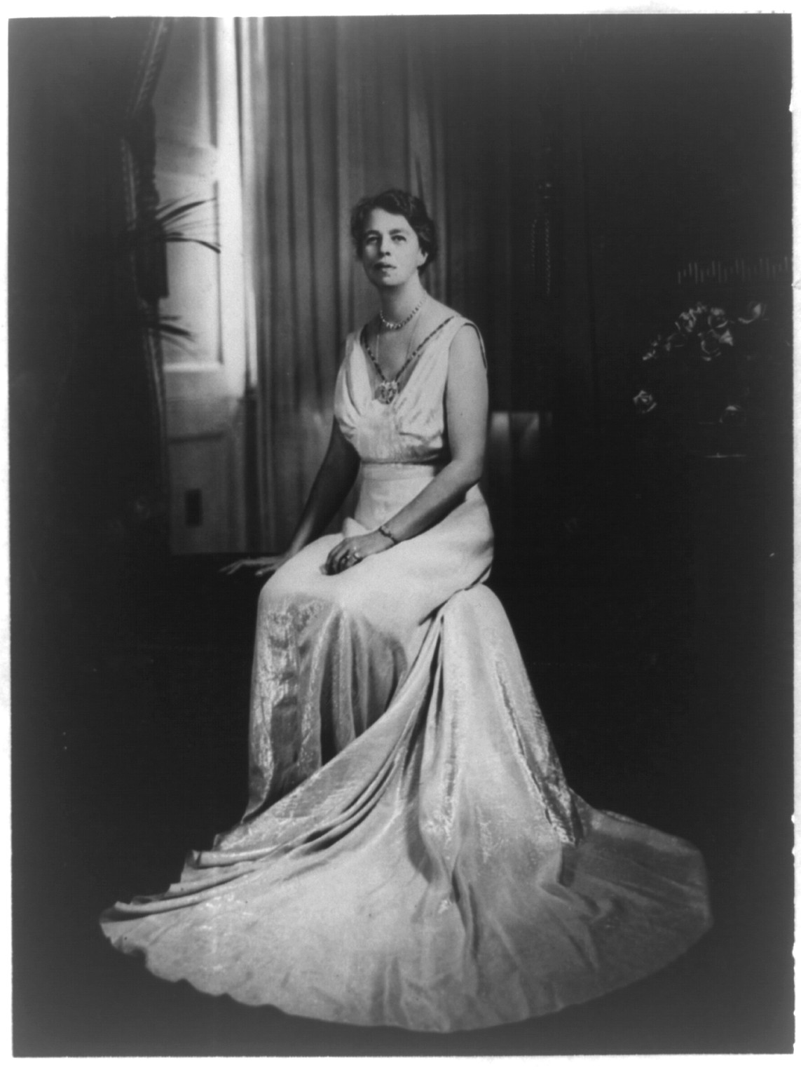 [Anna Eleanor Roosevelt, full-length portrait, seated, facing left, in Easter gown], 1936 — historic photograph