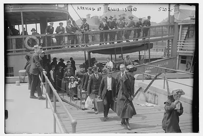Immigrants arriving at Ellis Island by ferry