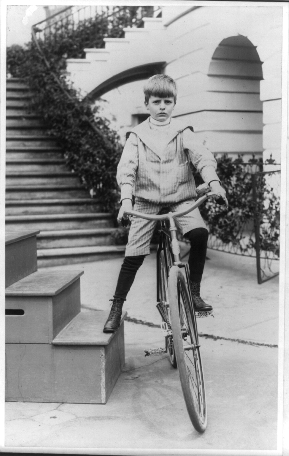 Archie Roosevelt on a bicycle, c1902 June 17. — historic photograph