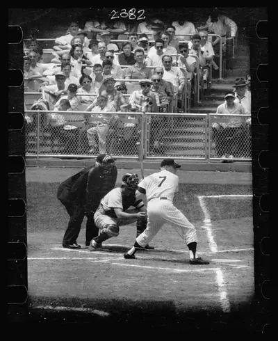 [Rear view of New York Yankee baseball player Mickey Mantel at bat] / Marvin E. Newman .