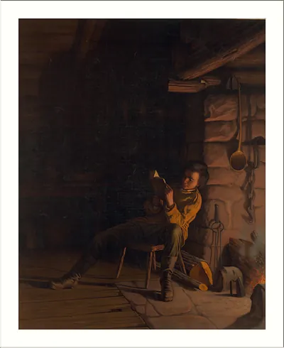 Boy reading by firelight in a log cabin