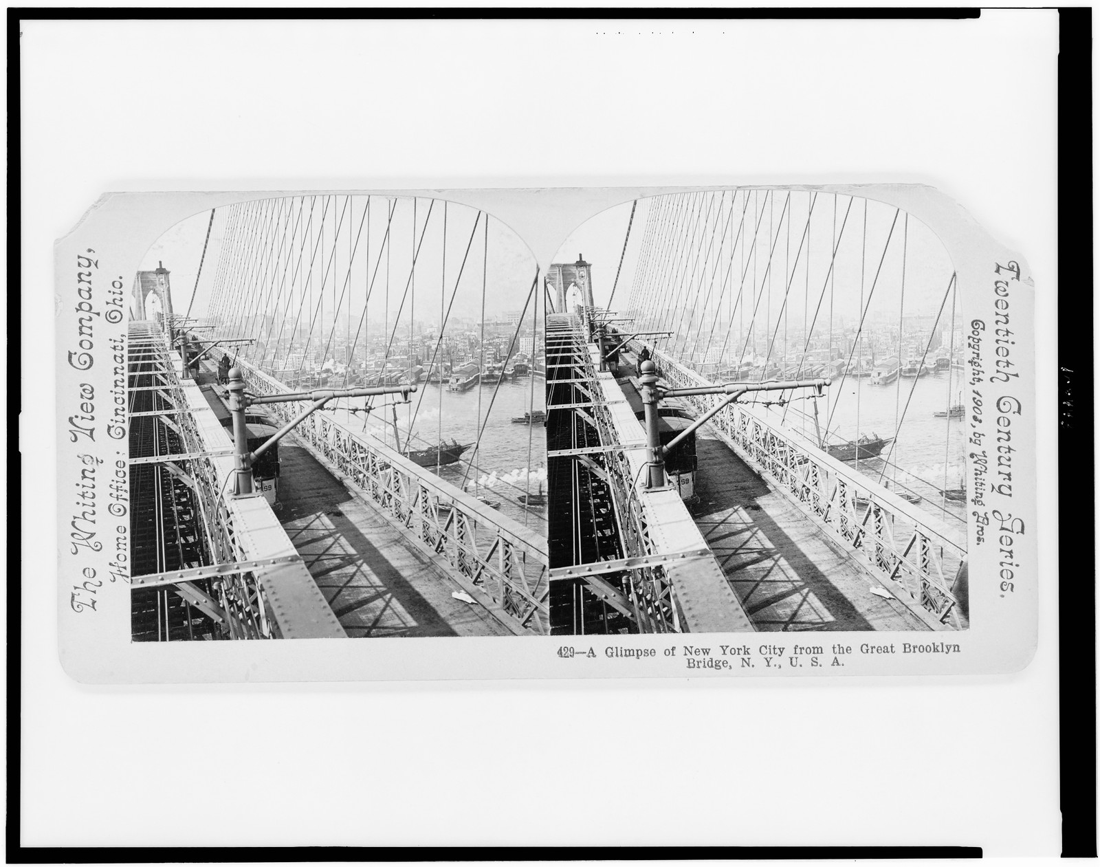 A glimpse of New York City from the great Brooklyn Bridge, N.Y., U.S.A., Cincinnati, Ohio : The Whiting View Company, c1903. — historic photograph