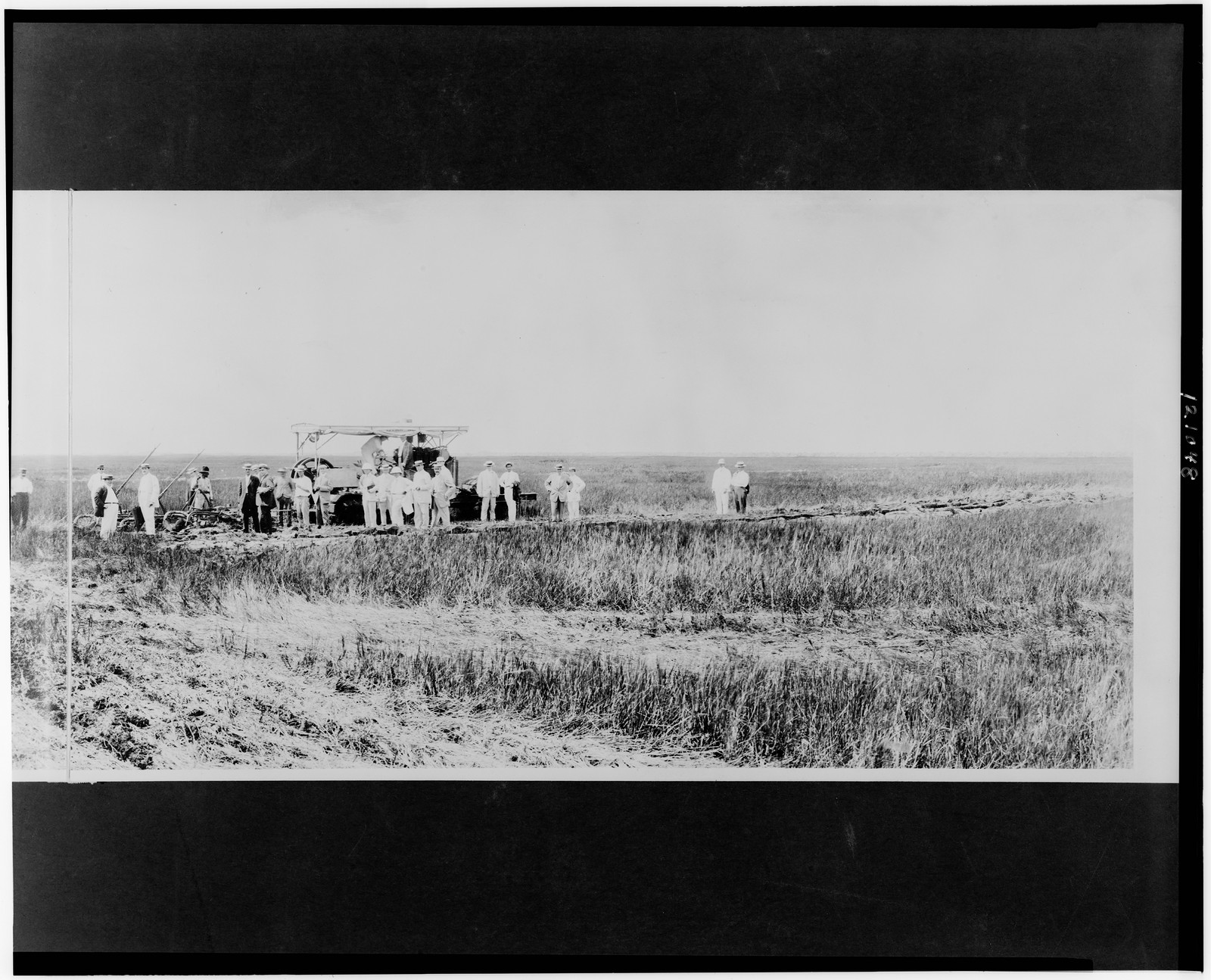 [Gasoline plow & gasoline road machine working on reclaimed prairie], c1912. — historic photograph