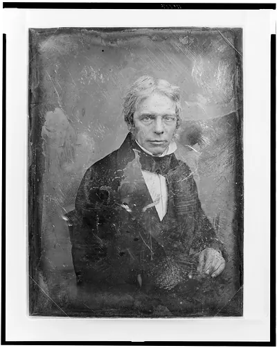 [Michael Faraday, half-length portrait, three-quarters to the right, seated in chair, hand resting on table]
