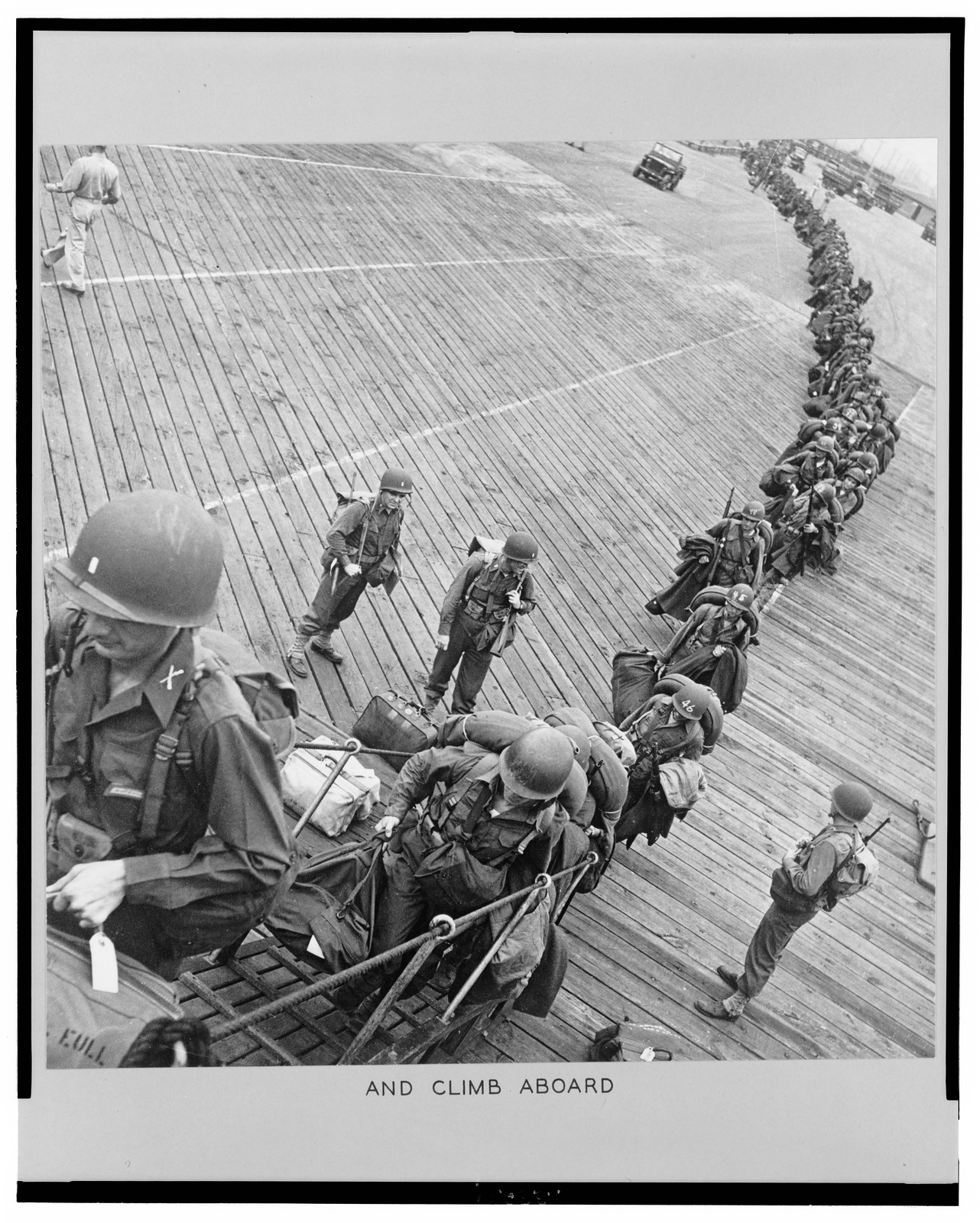 New York Port of embarkation during World War II. And climb aboard — historic photograph