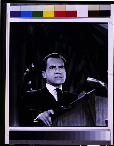 [Richard Nixon at podium, head-and-shoulders portrait, facing front]