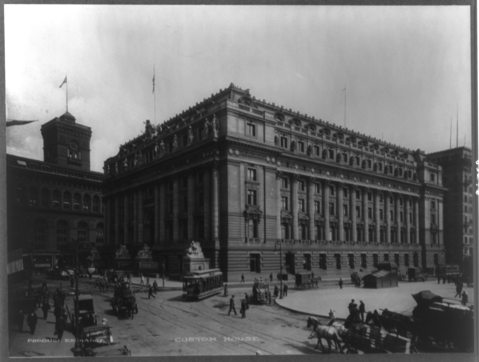 [NYC Custom house. Automobiles, horse-drawn wagons and streetcars on street], [no date recorded on caption card] — historic photograph