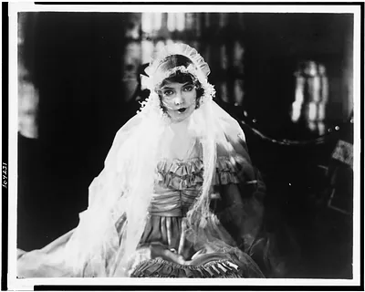 [Lillian Gish, three-quarter length portrait, seated, facing front, in Way down east"]"
