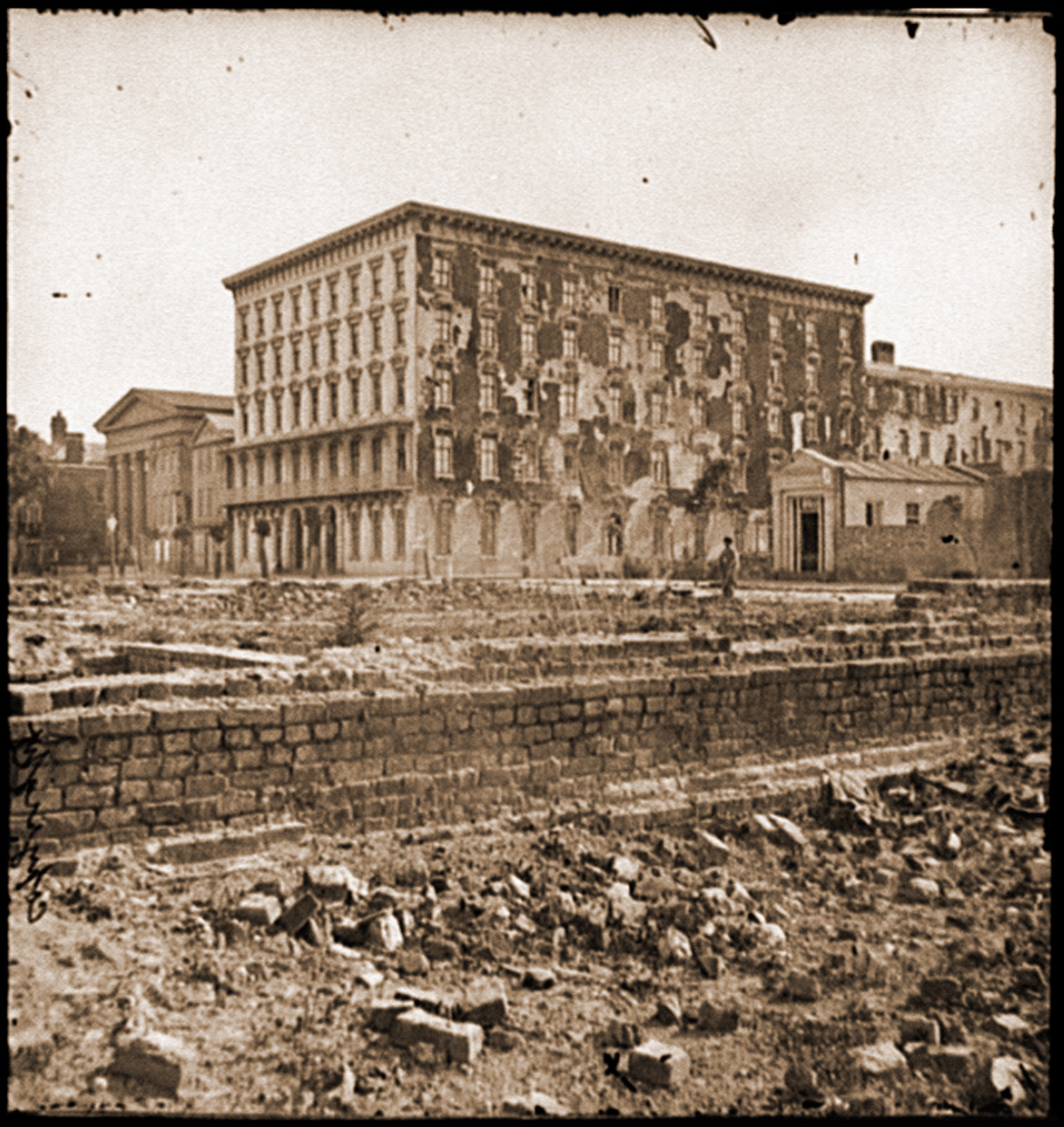 Charleston S.C. The fire-scarred Mills House; Hibernian Hall at left, 1865 — historic photograph
