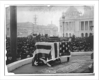 World's Columbian Exposition, Chicago, Ill. May 1, 1893 (opening ceremonies): The Button" [telegraph transmitter?] on flag covered table in front of crowd"