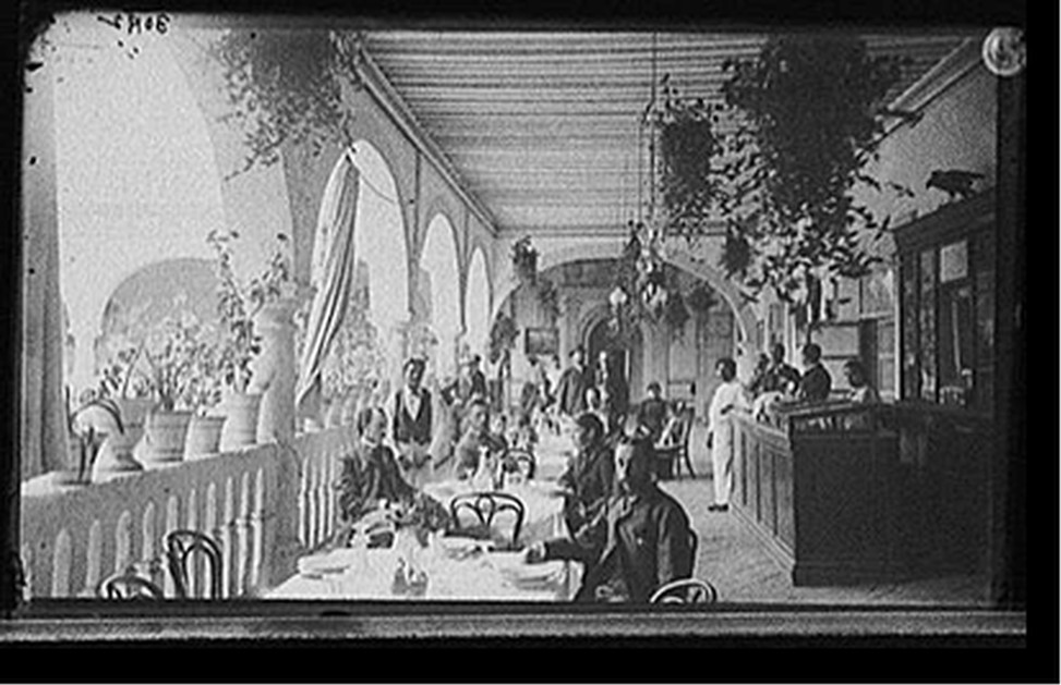 [Veranda restaurant, corridors of the Hotel Diligencias, Puebla, Mexico], [between 1880 and 1900] — historic photograph