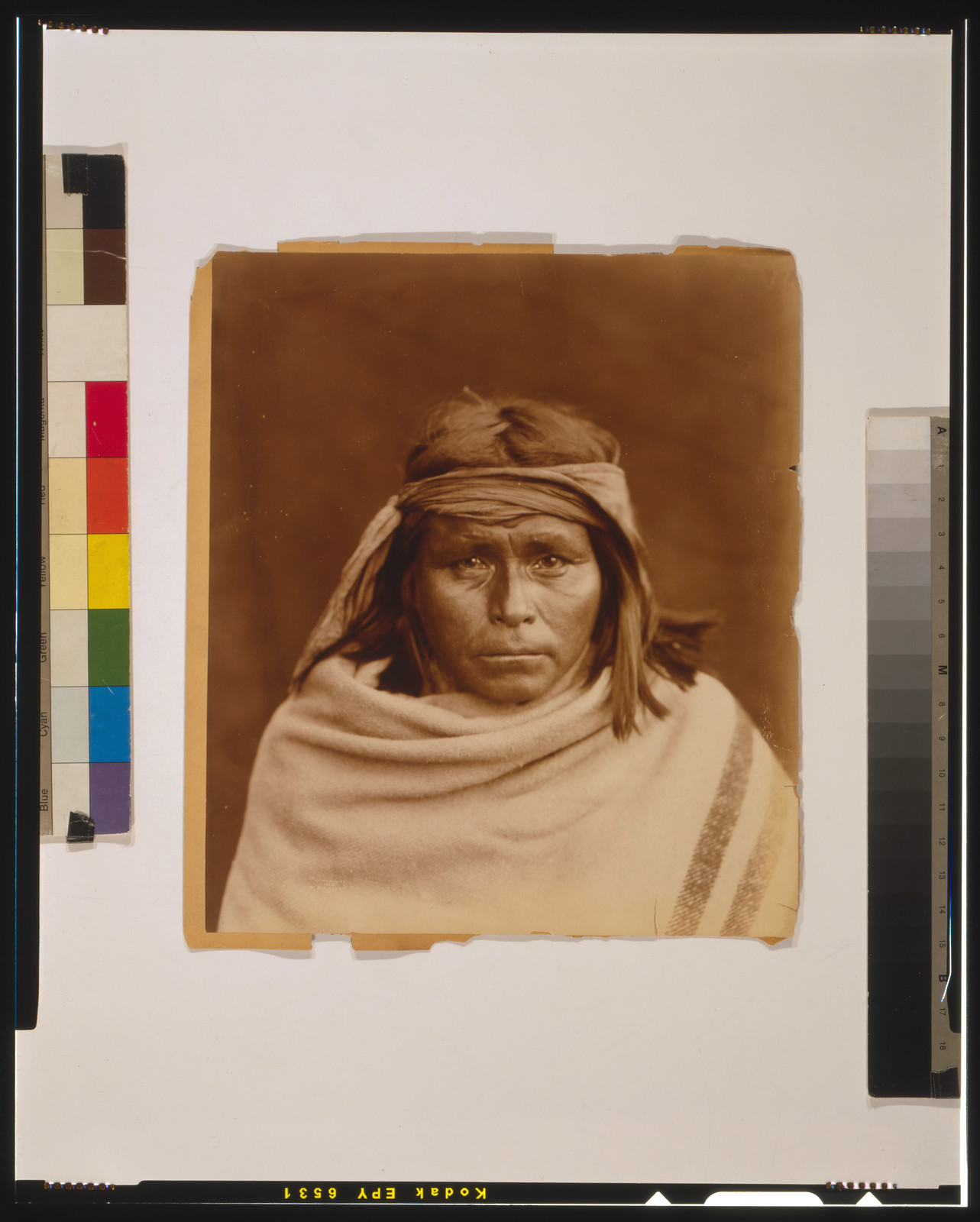 [Tah-Lay, Apache? Indian, head-and-shoulders portrait, facing front, wearing blanket and headband], c1903. — historic photograph