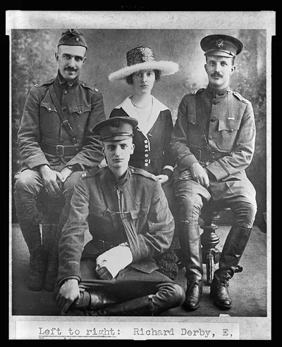 [Richard Derby, Archie Roosevelt in front, Eleanor and Kermit Roosevelt, full-length portrait, sitting, facing front, the men in military uniform]
