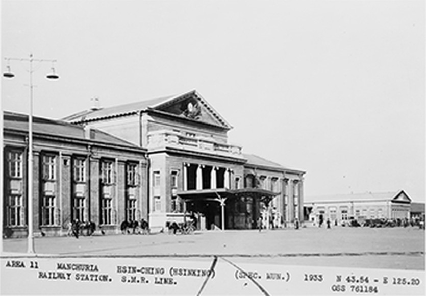 Area 11--Manchuria--Hsin-Ching (Hsinking)--(Spec. Mun.)--Railway station. S.M.R. Line, 1933 — historic photograph