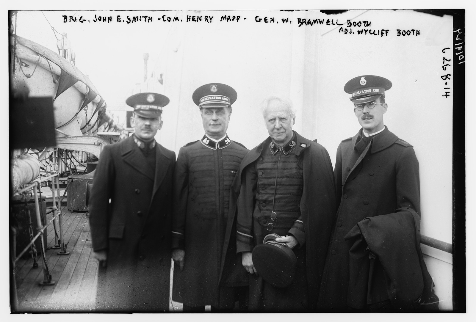 Brig. Gen. John E. Smith, Com. Henry Mapp, Gen. W. Bramwell Booth, & Adm. Wycliff Booth, n/a — historic photograph