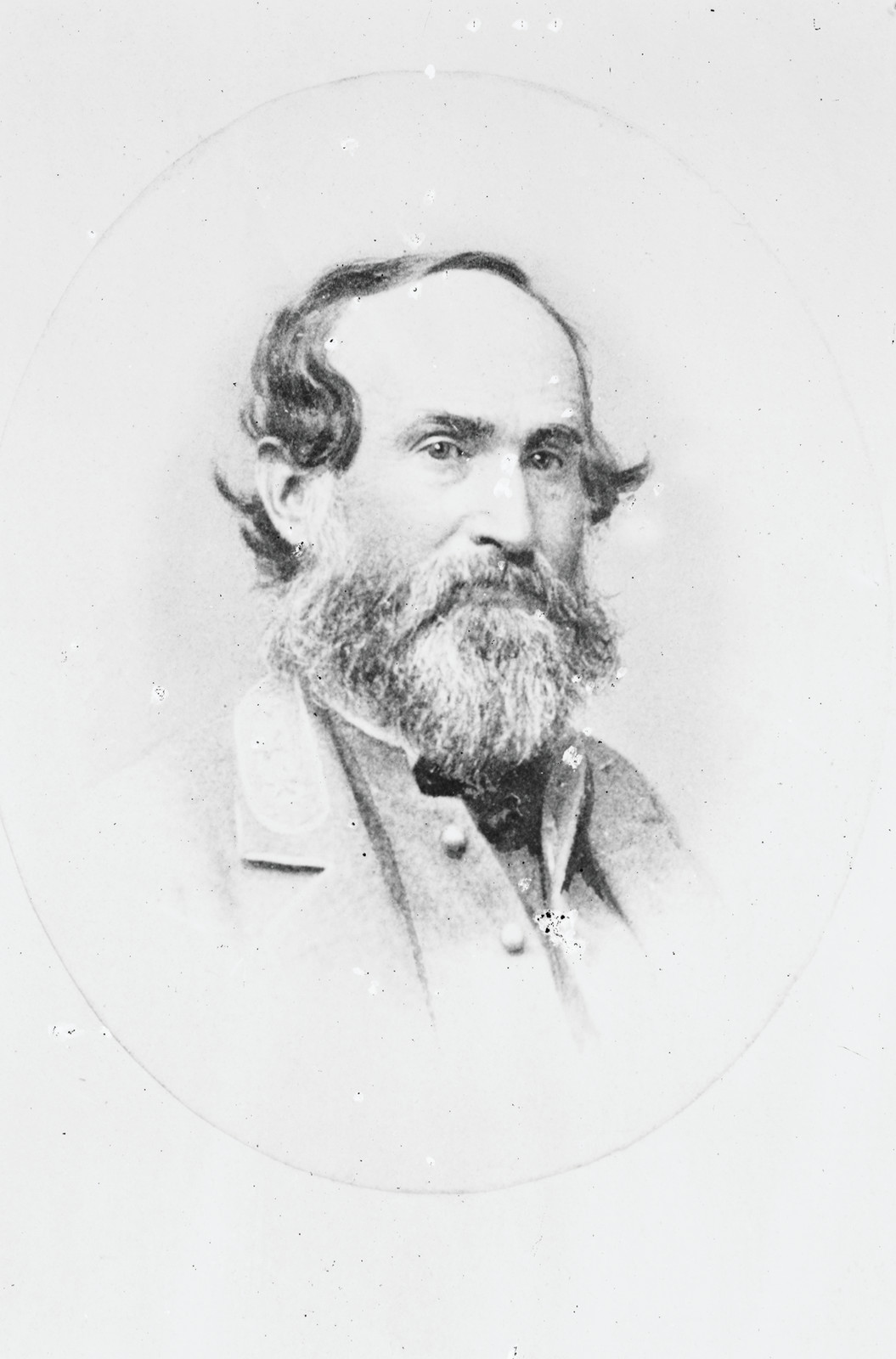 Bearded officer in military coat, oval studio portrait — historic image