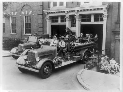 [Firemen on two fire engines in front of Engine Co. #1, 1643 K Street, N.W., Washington, D.C.]