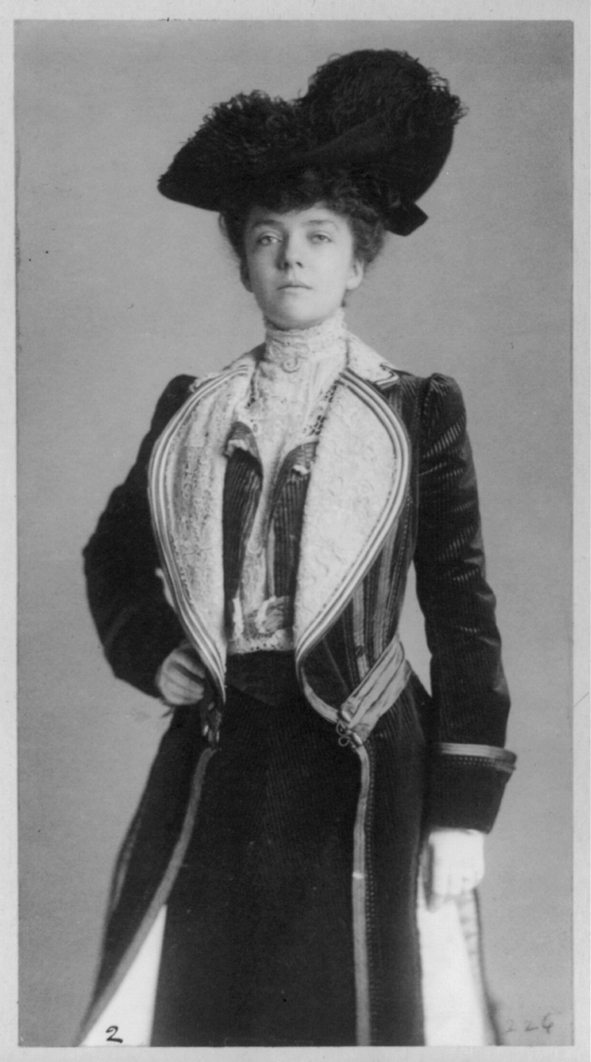 [Mrs. Alice Roosevelt Longworth, three-quarter length portrait, standing with right hand on hip, wearing coat and hat], c1902. — historic photograph
