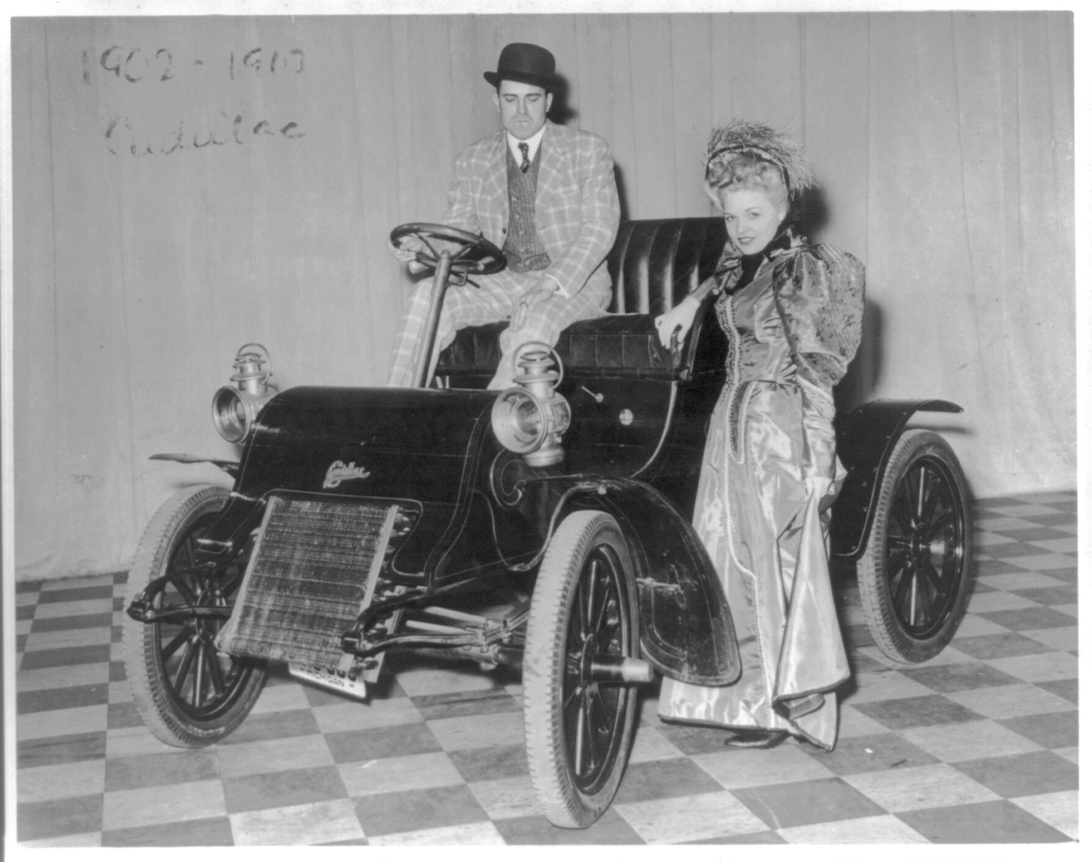 [A 1902 or 03 Cadillac runabout shown as it will appear in the Antique Automotive Exposition during the Golden Jubilee celebration in Detroit, May 29 to June 9] — historic photograph