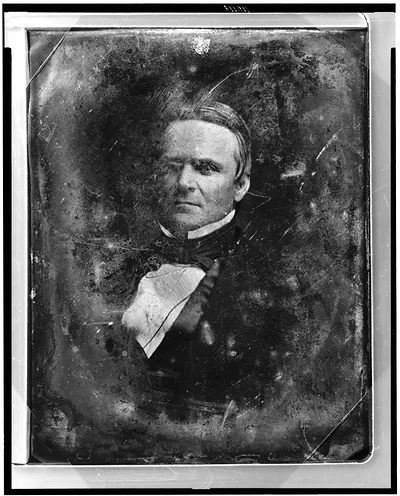 Daguerreotype portrait of a man in a dark coat