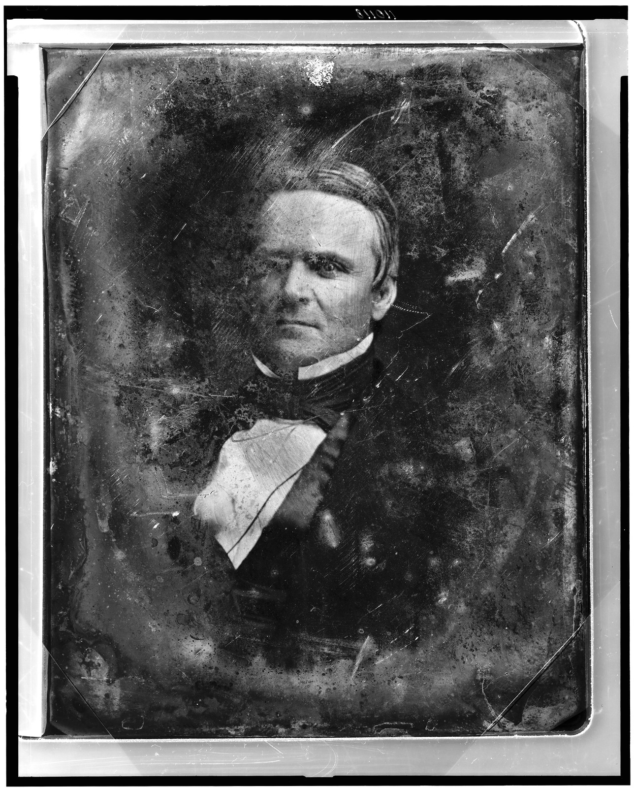 Daguerreotype portrait of a man in a dark coat, 1844 — historic photograph