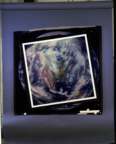 Satellite view of Earth showing clouds and North America