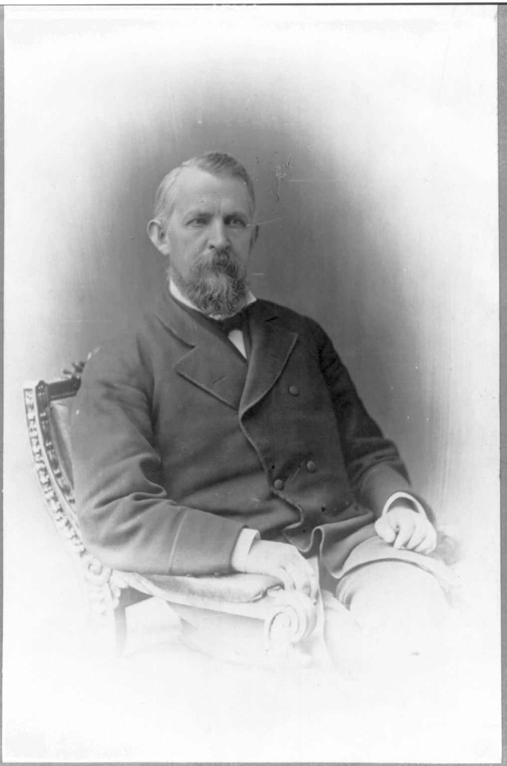 [John Randolph Tucker, half-length portrait, seated, facing front] — historic photograph