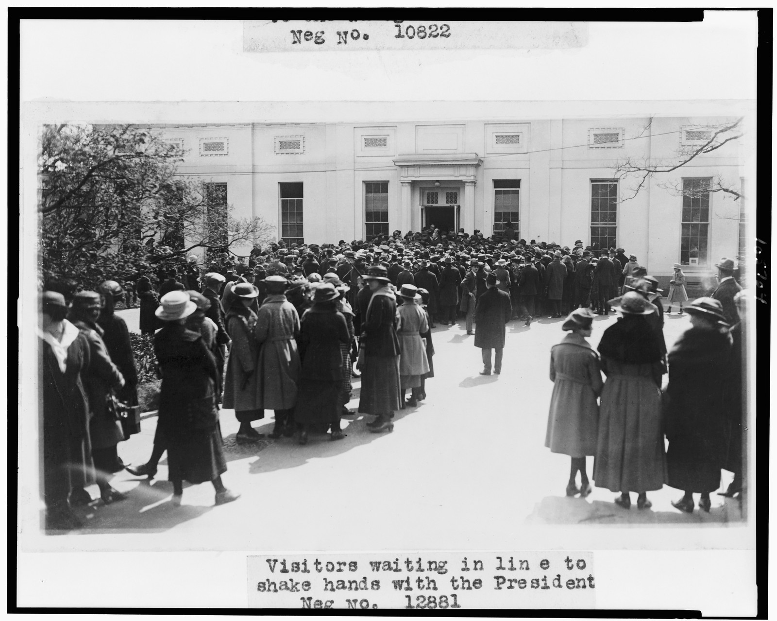 Visitors waiting in line to shake hands with the President, [between 1921 and 1923, probably 1921?] — historic photograph