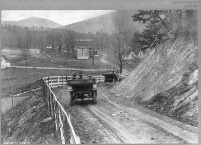 [Va. - Rockbridge Alum Spring - 2 autos on mountain road looking toward entrance]