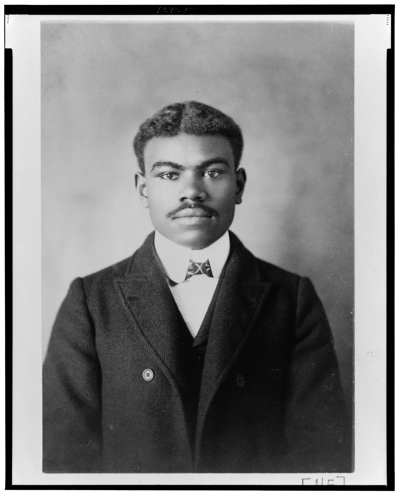 [African American man, half-length portrait, facing front], [1899 or 1900] — historic photograph