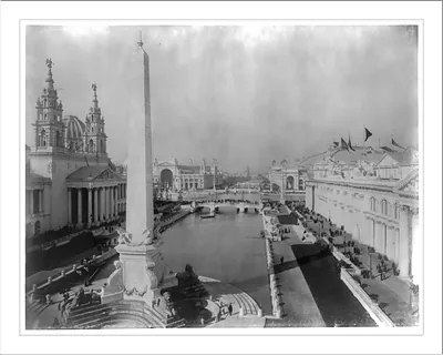 [World's Columbian Exposition, Chicago, 1893: view looking down canal; obelisk monument in foreground]